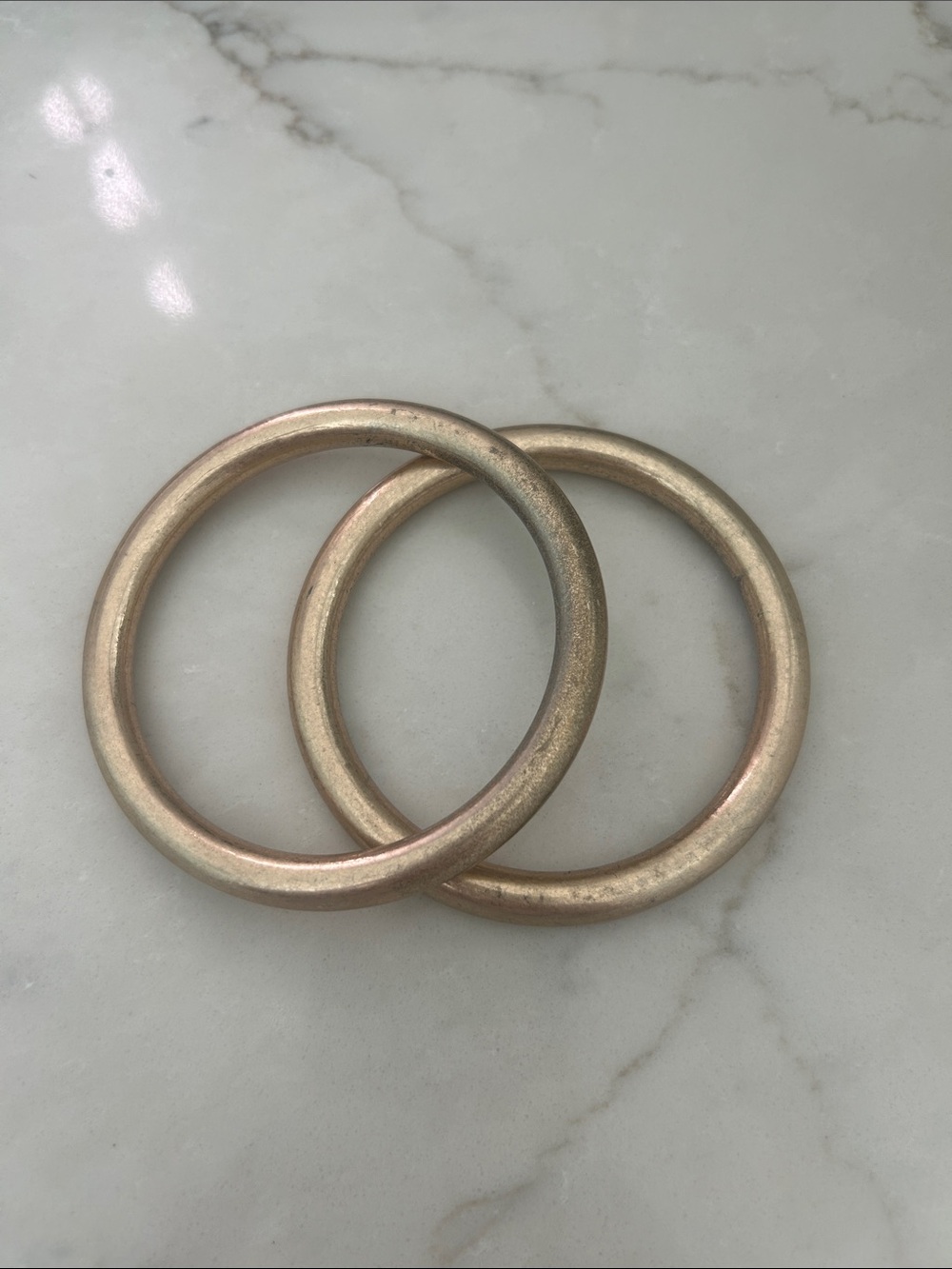 Distressed gold metal bangles